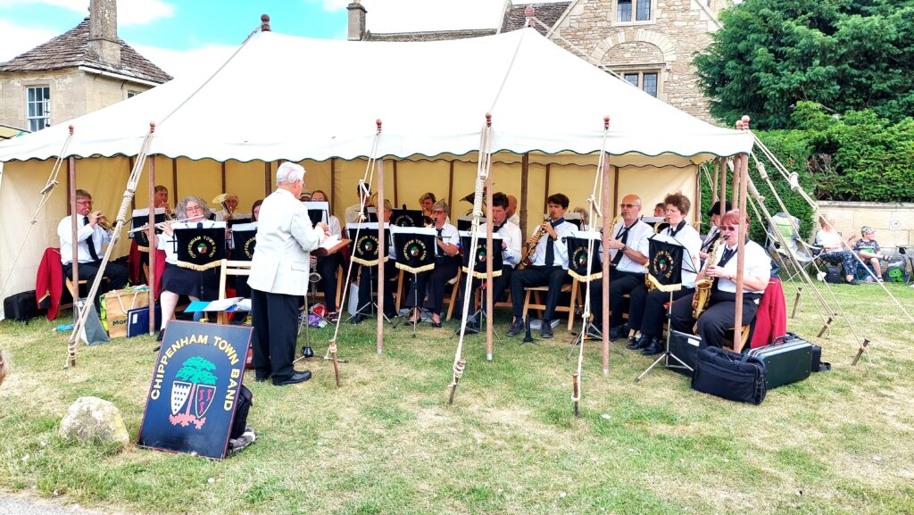 Chippenham Town Band at Biddestone Fete (many musicians and conductor)